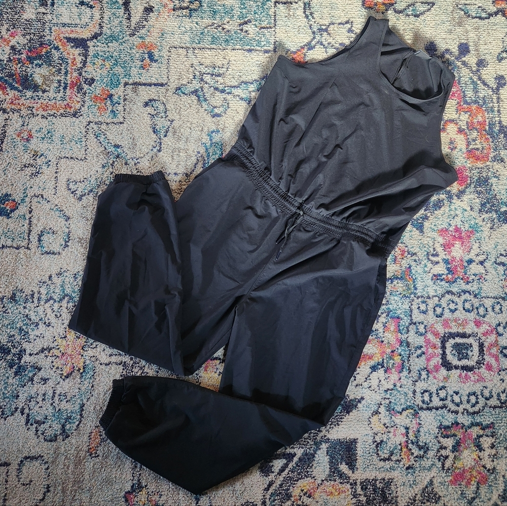 The North Face Never Stop Wearing Jumpsuit Black Sleeveless Drawstring Waist